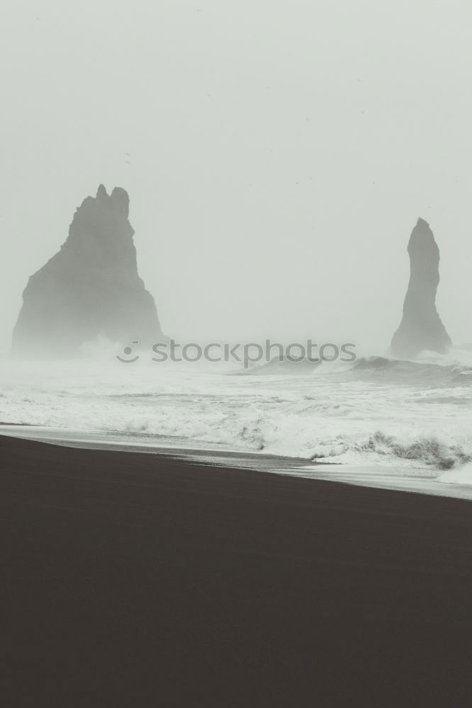 Similar – Image, Stock Photo Big chunk. Huge rock lies in the Pacific surf. Queensland. Australia. In the background very small : skyscrapers.