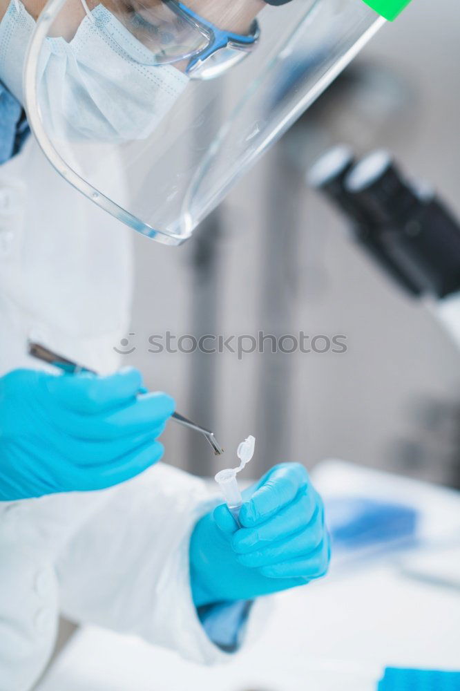 Similar – Image, Stock Photo Hands holding plastic test tube