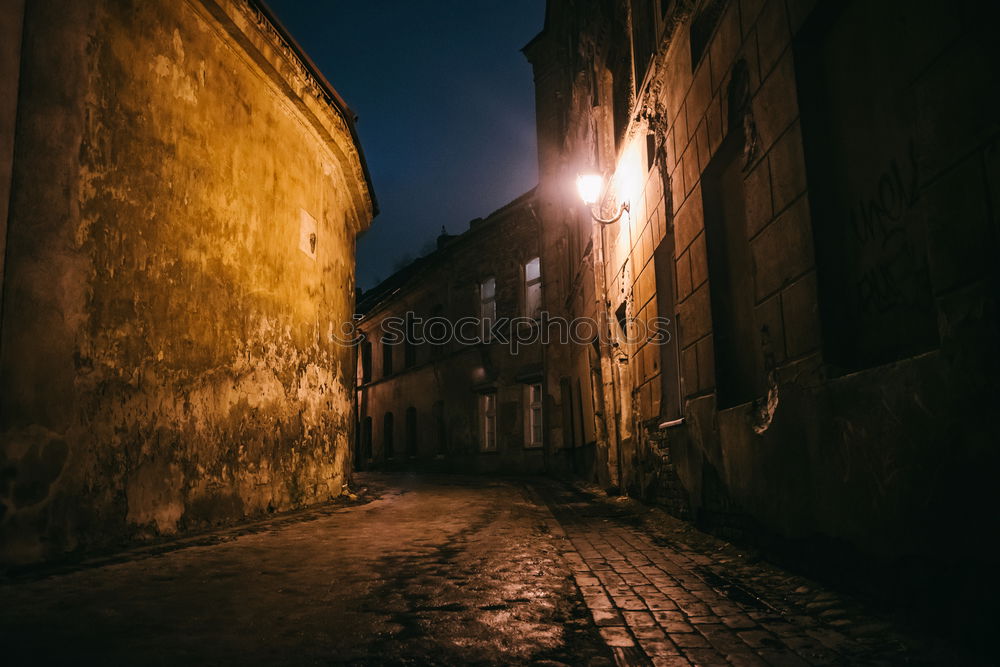 Similar – The narrow streets with tall buildings