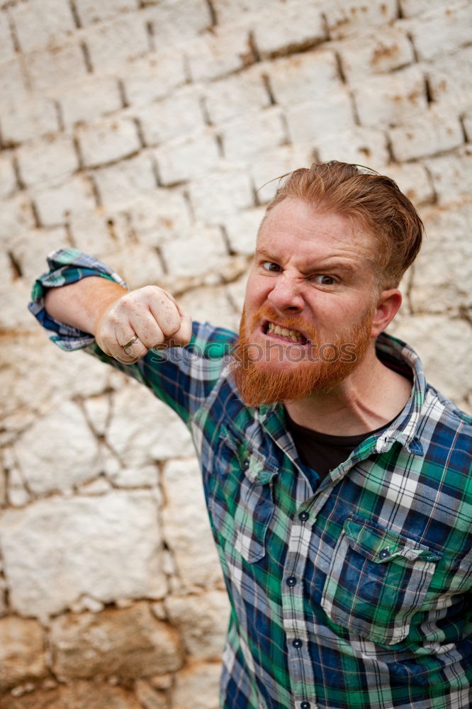 Similar – Portrait of a hipster guy putting silly face