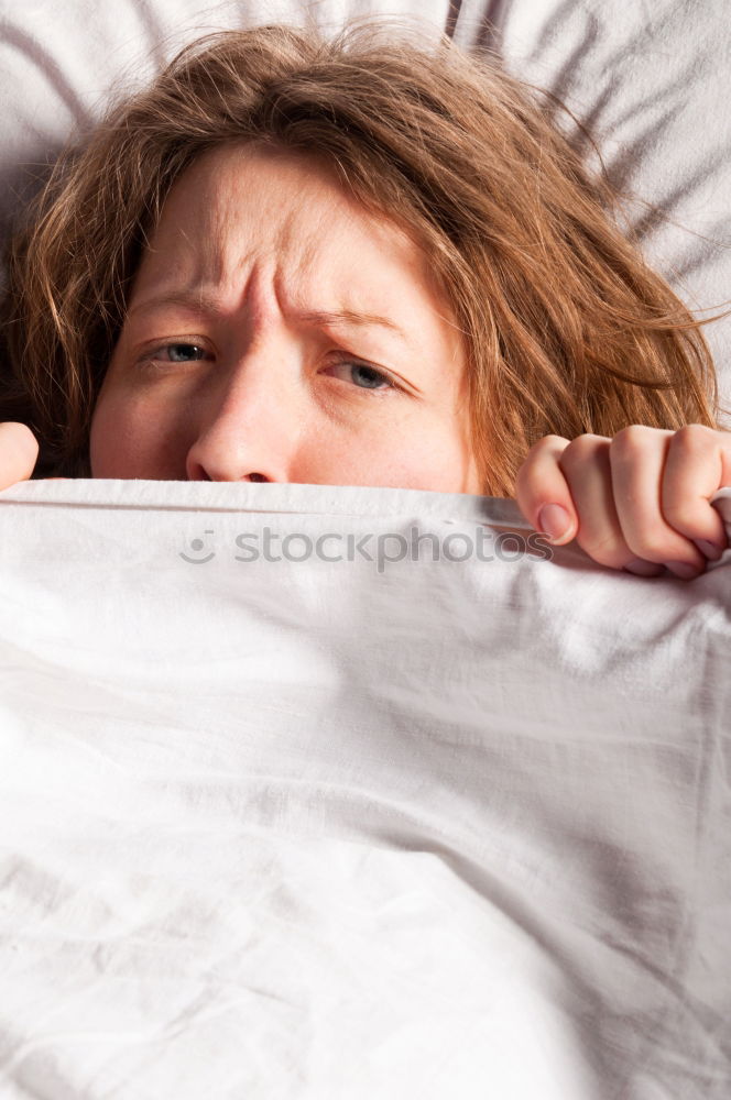 Similar – Portrait of an attractive, young, sexy dark haired woman in Bed, hand and head on the pillow under the blanket, Copy space.