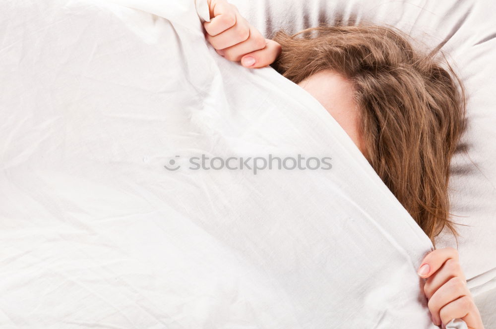 Similar – Little girl lying in a bed with teddy bear at the morning