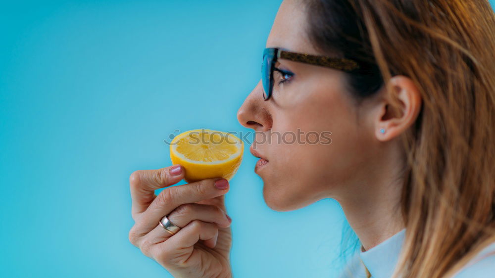 Similar – Crop woman eating sushi