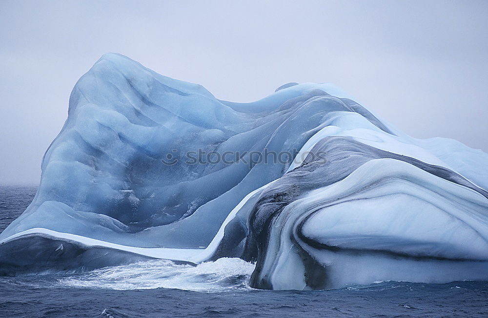 Similar – Wall of glacier in sea