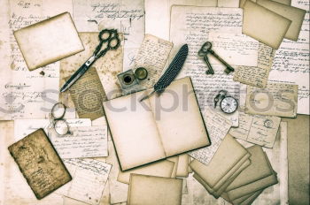 Similar – Image, Stock Photo old paper picture lying on a diary page