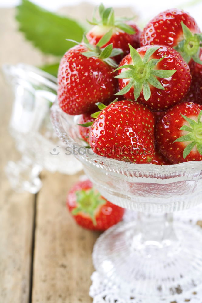 Similar – Strawberries in a bowl on an old wooden table