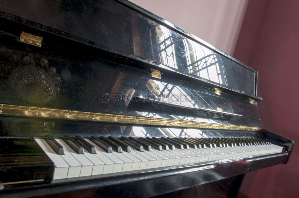 Similar – Image, Stock Photo old piano with a lot of white keys and black ones in the spaces in between