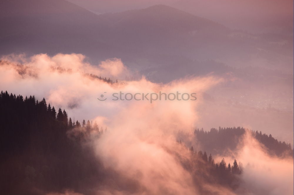 Similar – Alpine village in mountains. Smoke, bonfire and haze