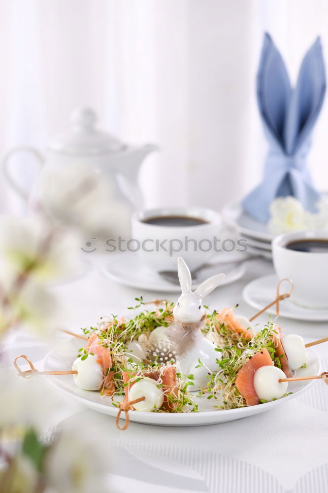 Similar – Image, Stock Photo Spring Table Decoration with Plate, Cutlery and Hyacinths