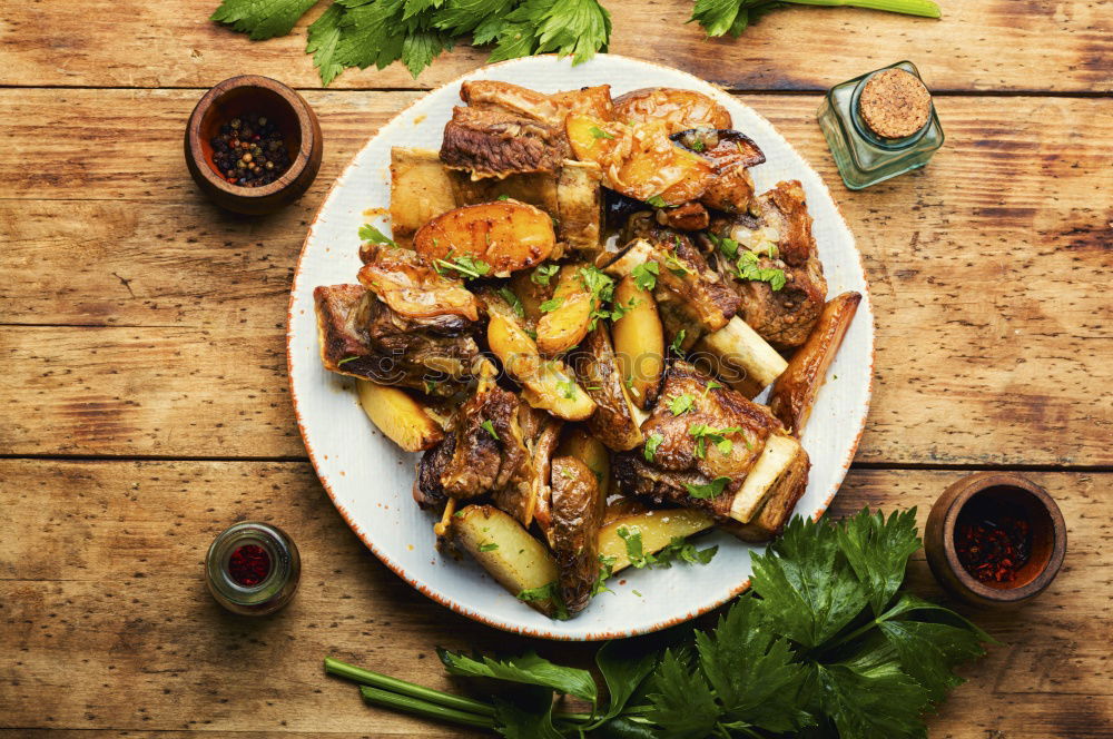 Similar – Image, Stock Photo Roasted pork fillet with crust and baked potatoes