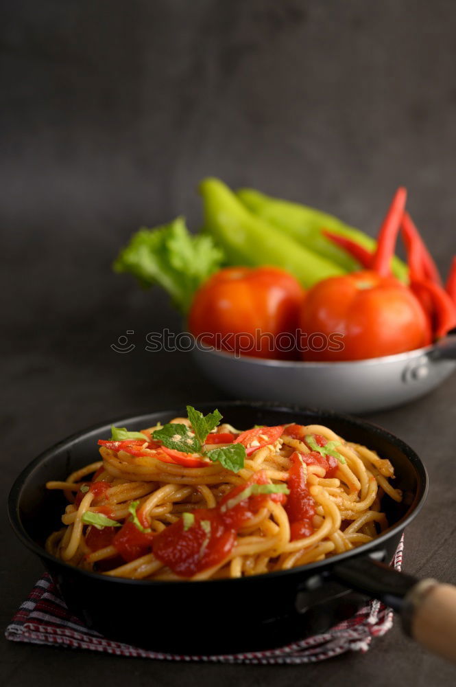 Similar – Plate of penne pasta with arrabiata sauce