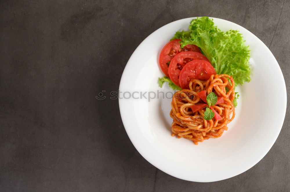 Similar – Plate of penne pasta with arrabiata sauce