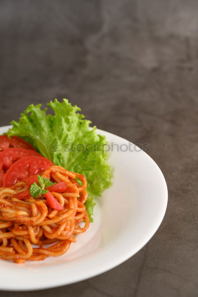 Similar – Plate of penne pasta with arrabiata sauce