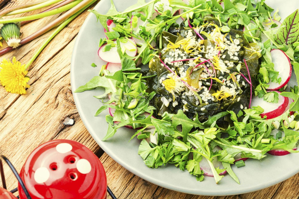 Similar – Spring salad of baby spinach, herbs, arugula and lettuce