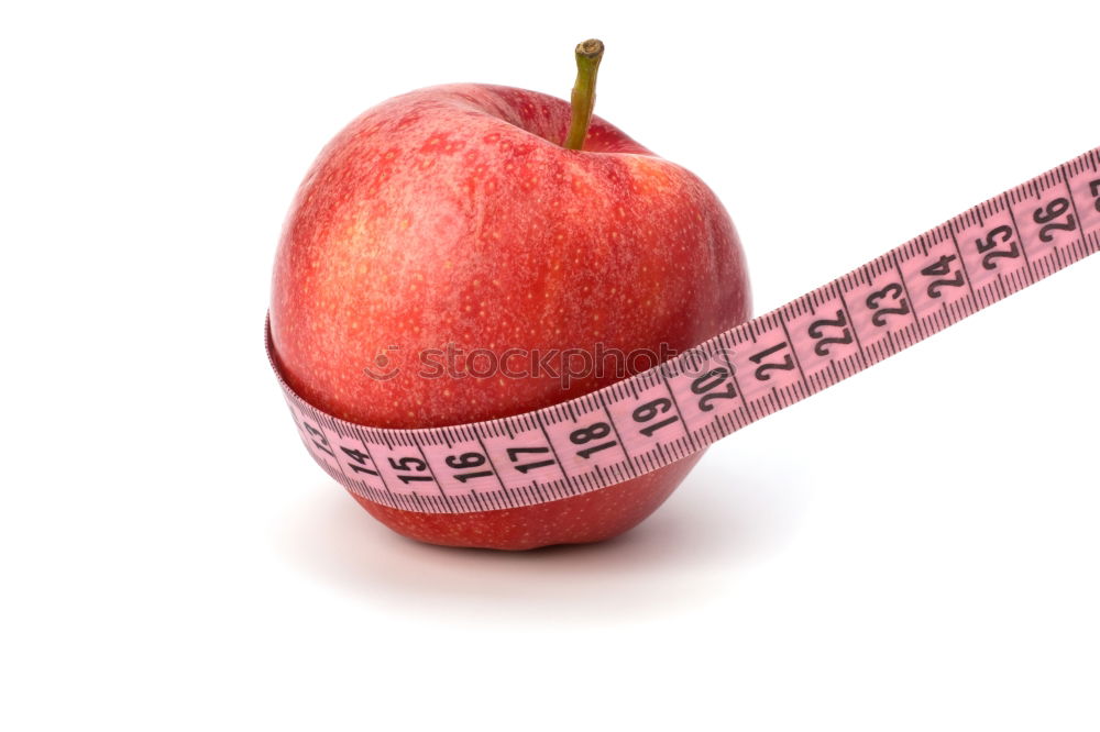 Similar – Red apple with a tape measure