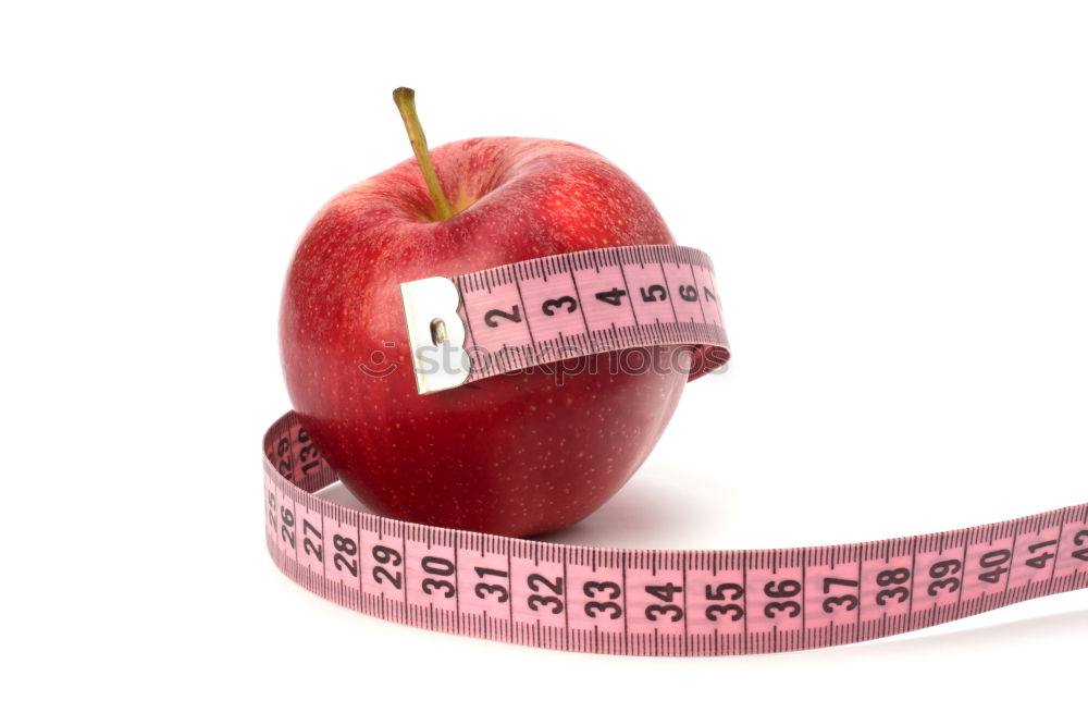 Similar – Red apple with a tape measure