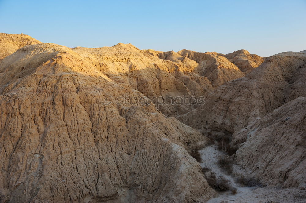 Similar – Image, Stock Photo Water near stone desert hills and blue sky