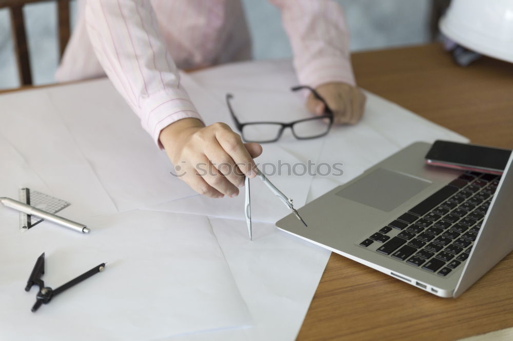 Similar – Image, Stock Photo Architect or planner working on drawings for construction