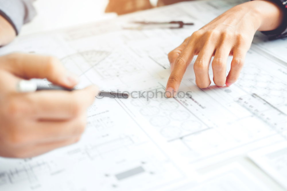 Similar – Image, Stock Photo Architect or planner working on drawings for construction