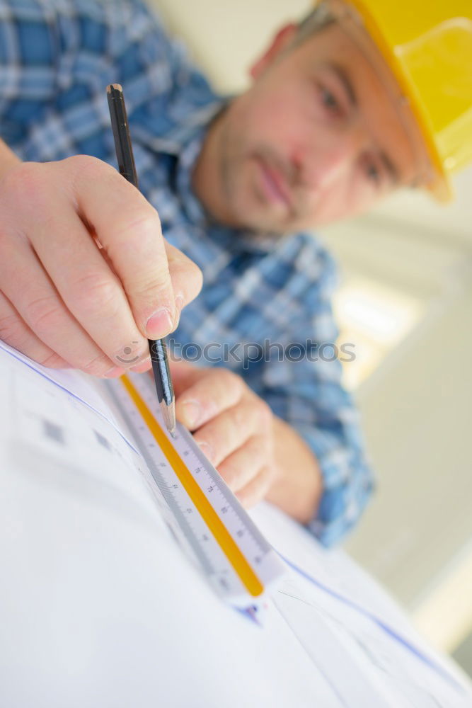 Image, Stock Photo Architect or planner working on drawings for construction