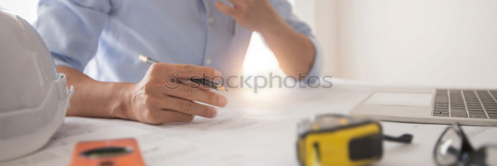 Image, Stock Photo Architect or planner working on drawings for construction