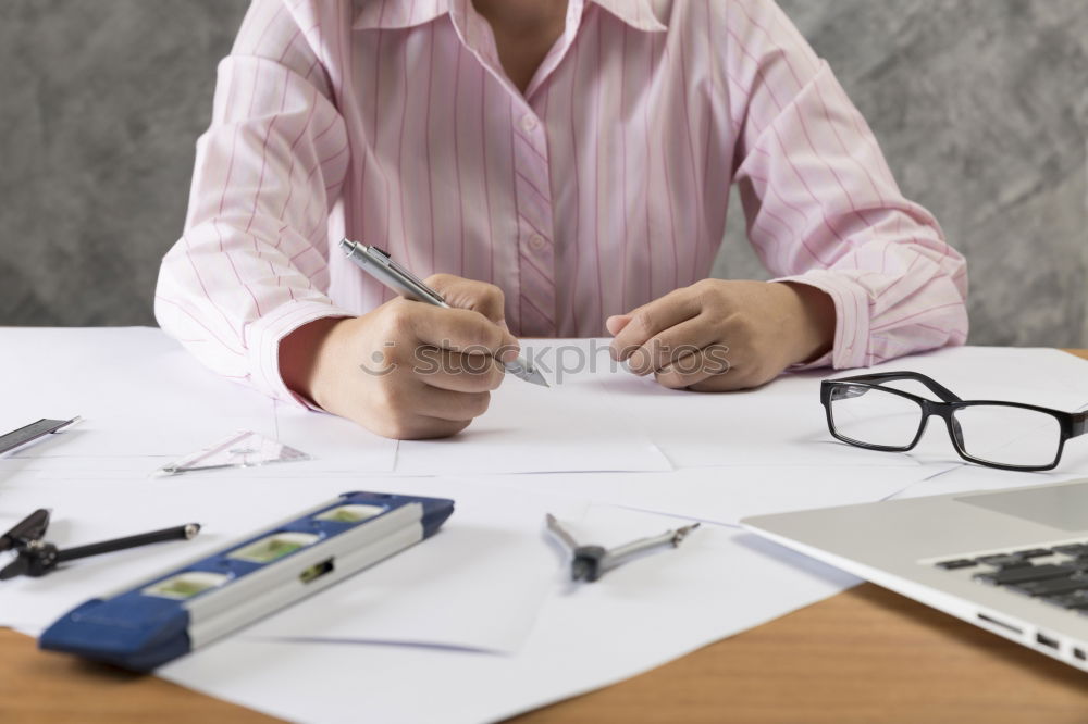 Similar – Image, Stock Photo Architect or planner working on drawings for construction