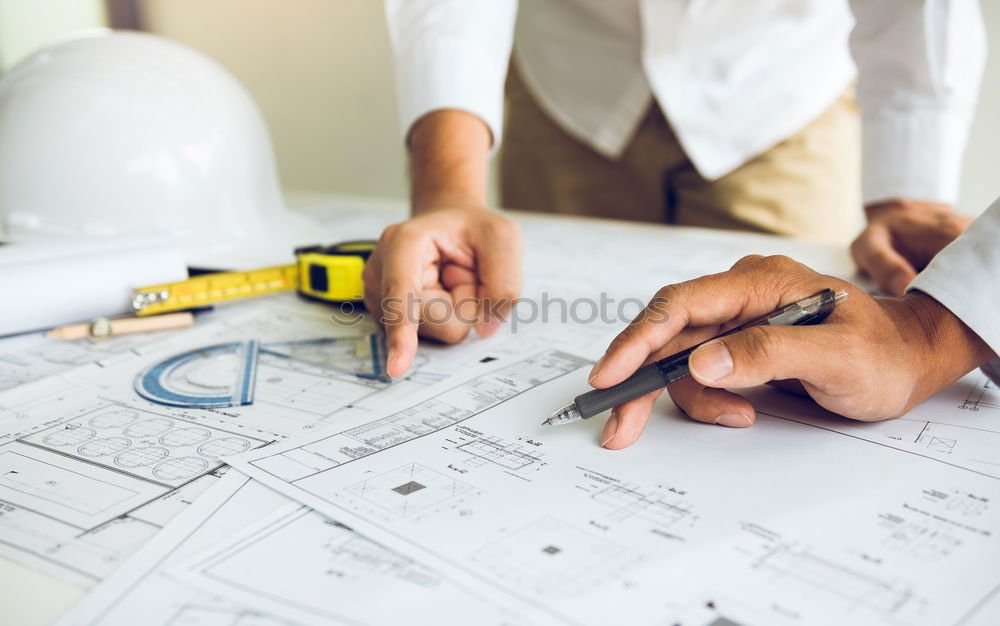 Similar – Image, Stock Photo Architect or planner working on drawings for construction