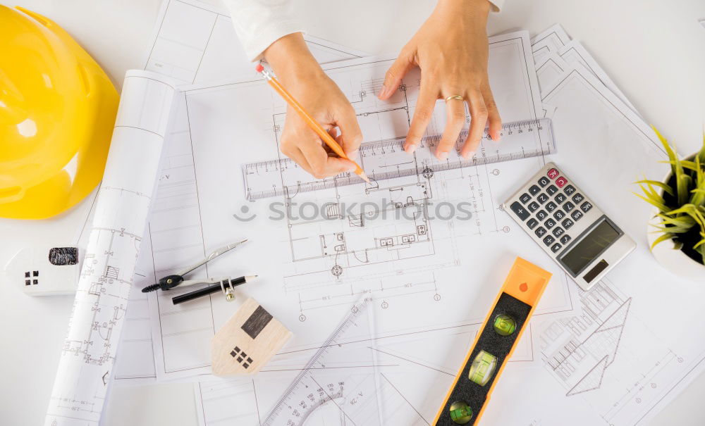 Similar – Image, Stock Photo Architect or planner working on drawings for construction