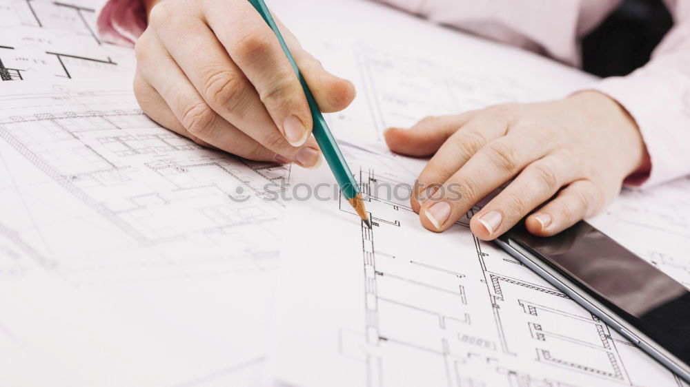 Similar – Image, Stock Photo Architect or planner working on drawings for construction