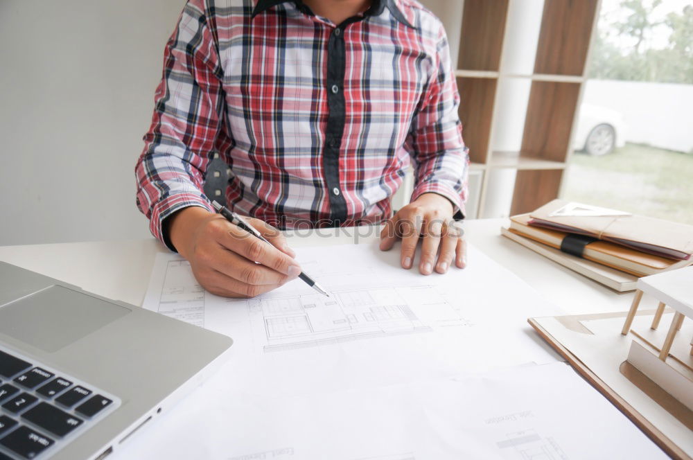 Image, Stock Photo Architect or planner working on drawings for construction