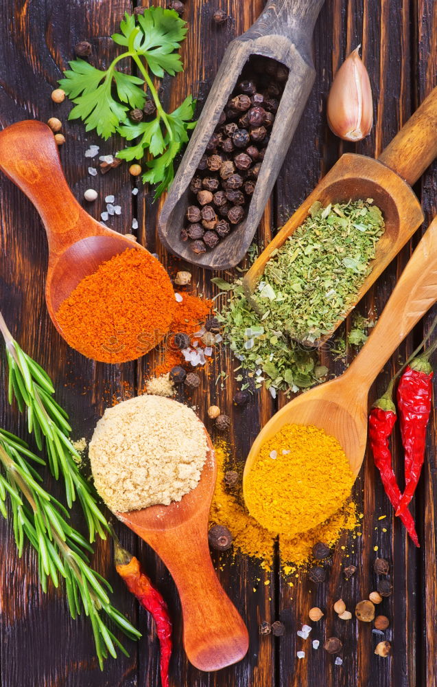 Similar – Image, Stock Photo Colourful spices on the kitchen table