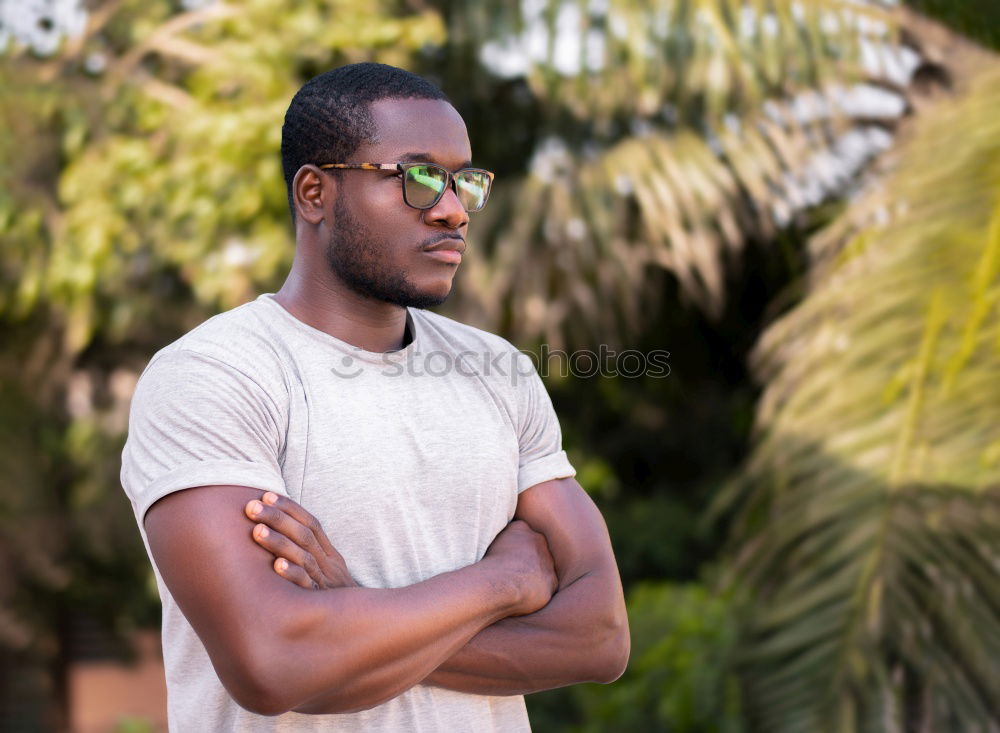 Similar – Image, Stock Photo Young black man wearing casual clothes and sunglasses outdoors