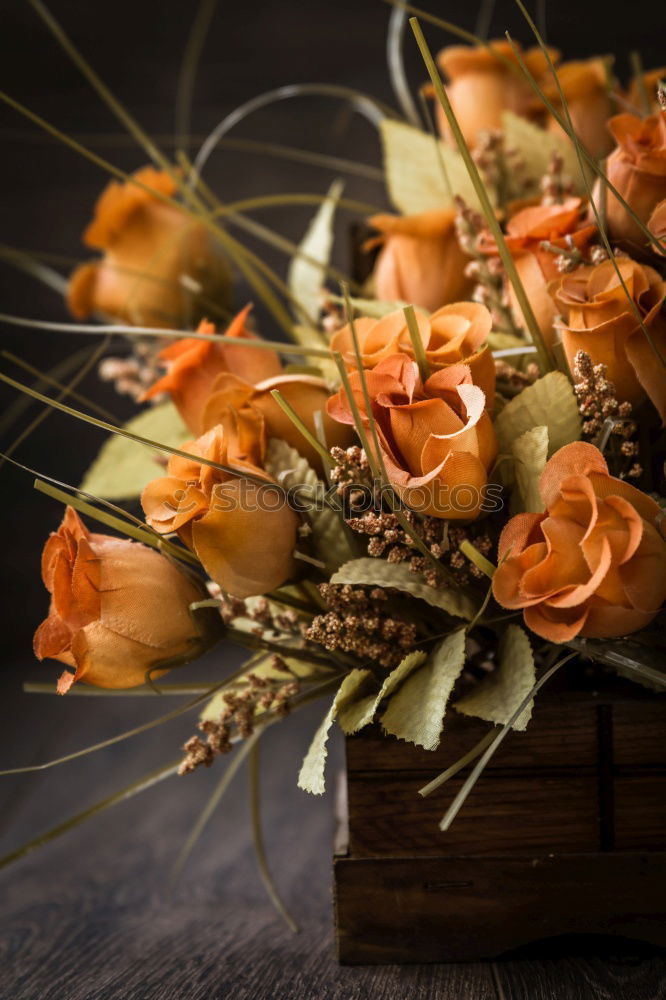 Old scissors and bunch of flowers