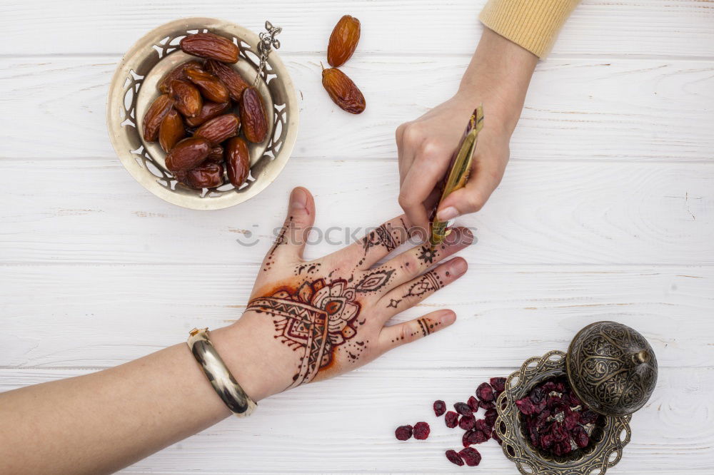 Similar – Image, Stock Photo Removing the grains of a head of garlic