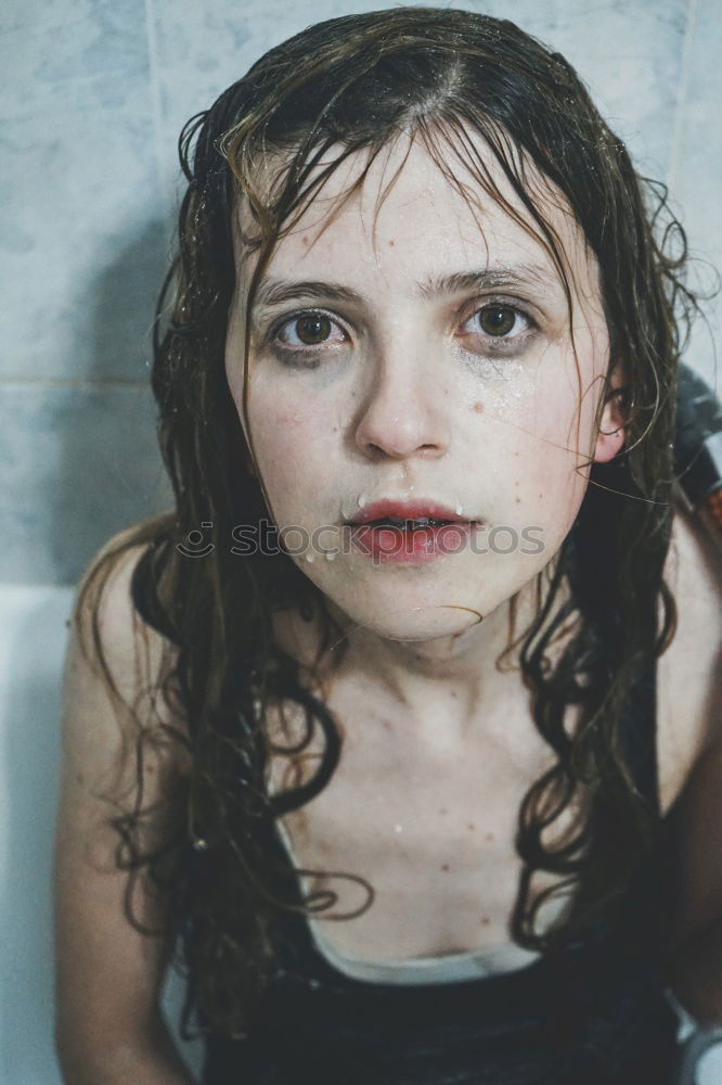 Similar – Portrait of a beautiful girl with big blue eyes looking at camera with surprised expression