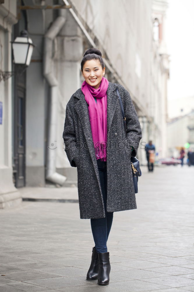 Similar – Image, Stock Photo Attractive woman in jeans and an overcoat