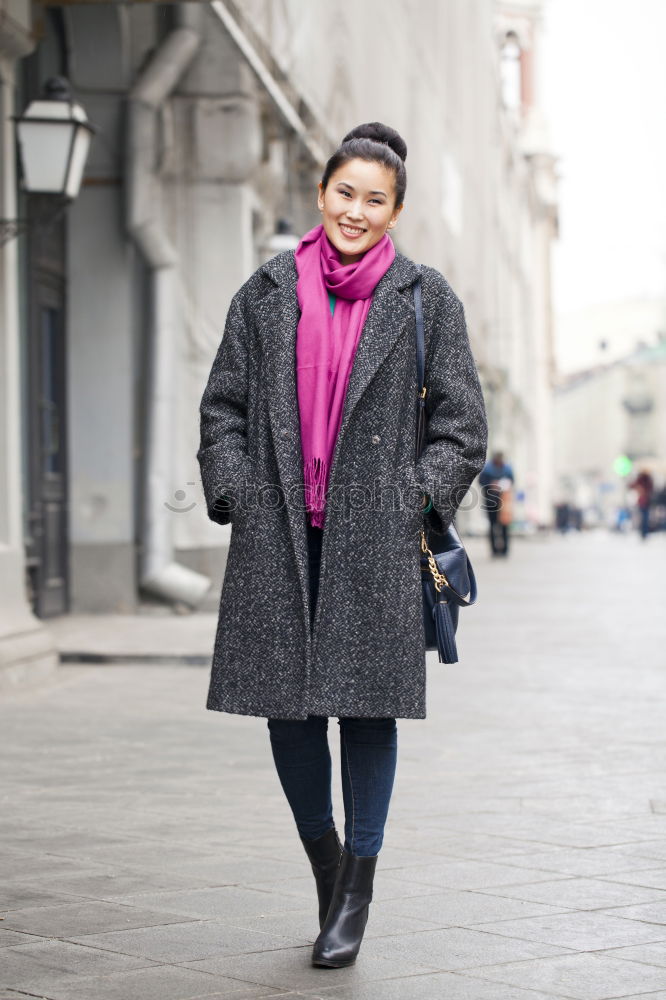 Similar – Image, Stock Photo Attractive woman in jeans and an overcoat