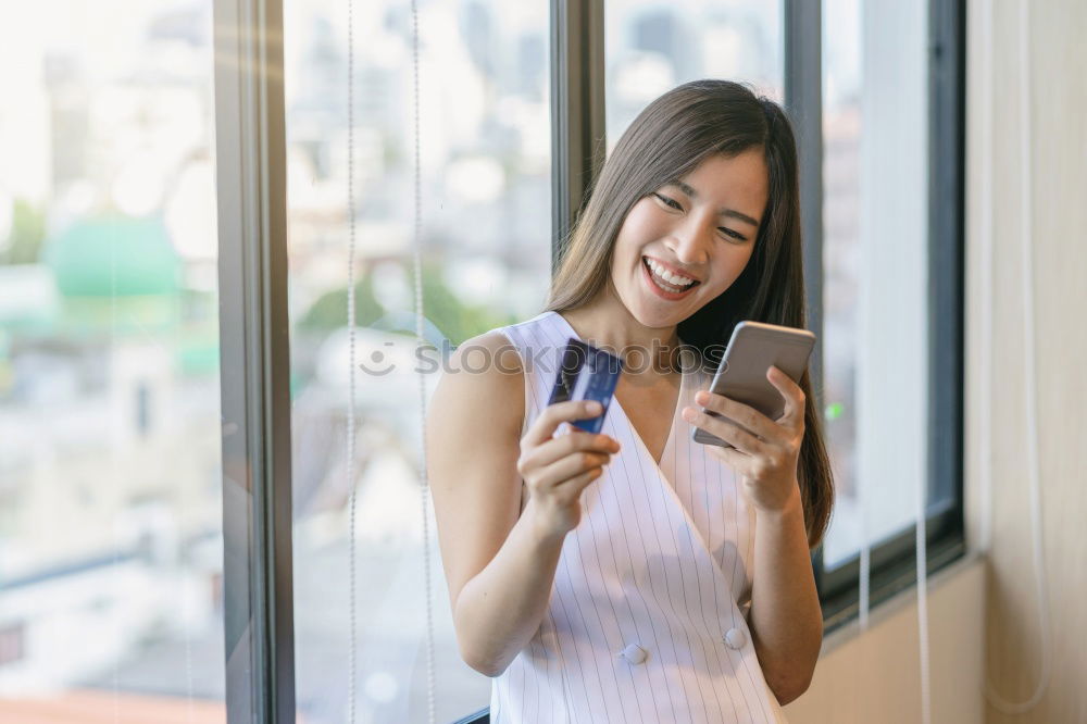 Similar – Image, Stock Photo Asian young woman texting message with phone