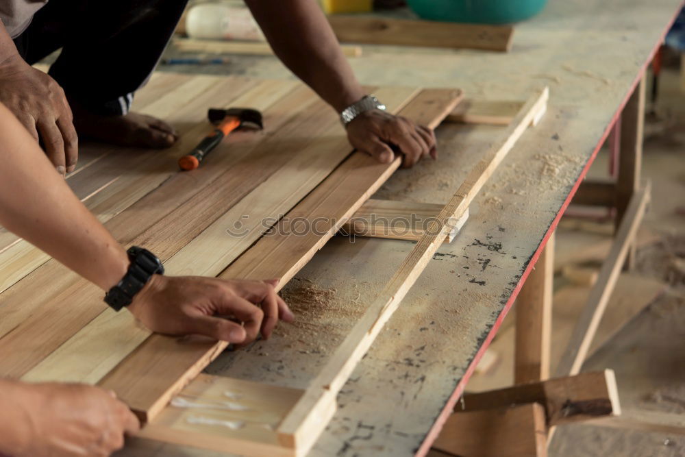 Similar – Carpenter tools on wooden table with sawdust. Circular Saw.