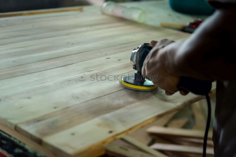 Similar – Carpenter tools on wooden table with sawdust. Circular Saw.