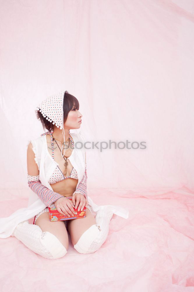 Similar – Image, Stock Photo Women sitting together at orange wall