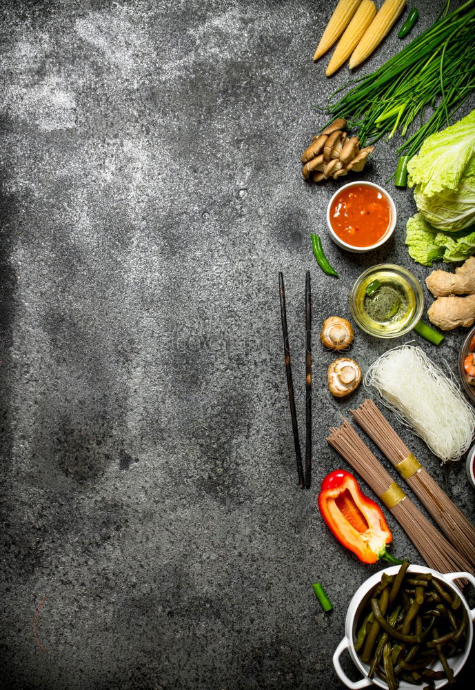 Similar – Image, Stock Photo Vegetables and herbs for cooking around empty chopping board