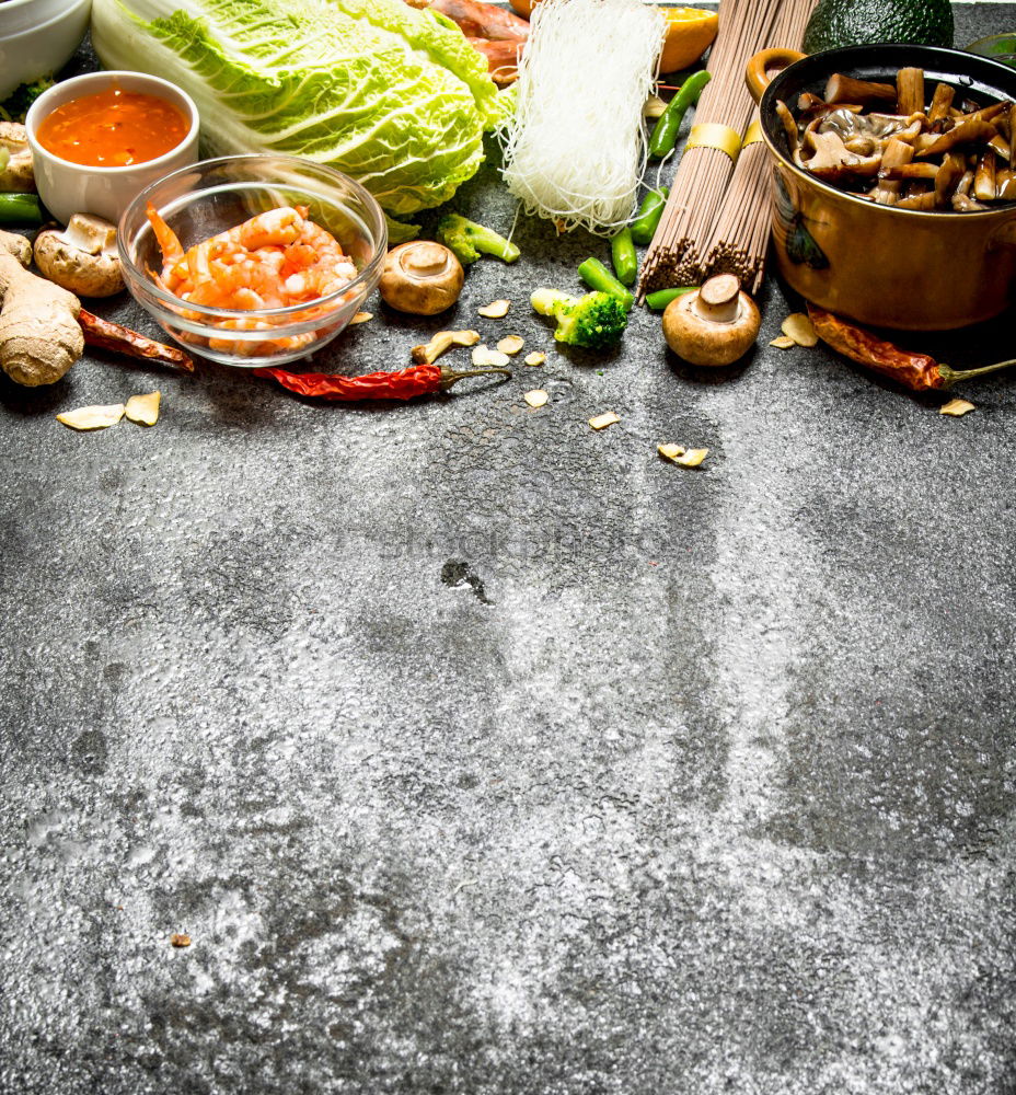 Similar – Image, Stock Photo Vegetables and herbs for cooking around empty chopping board