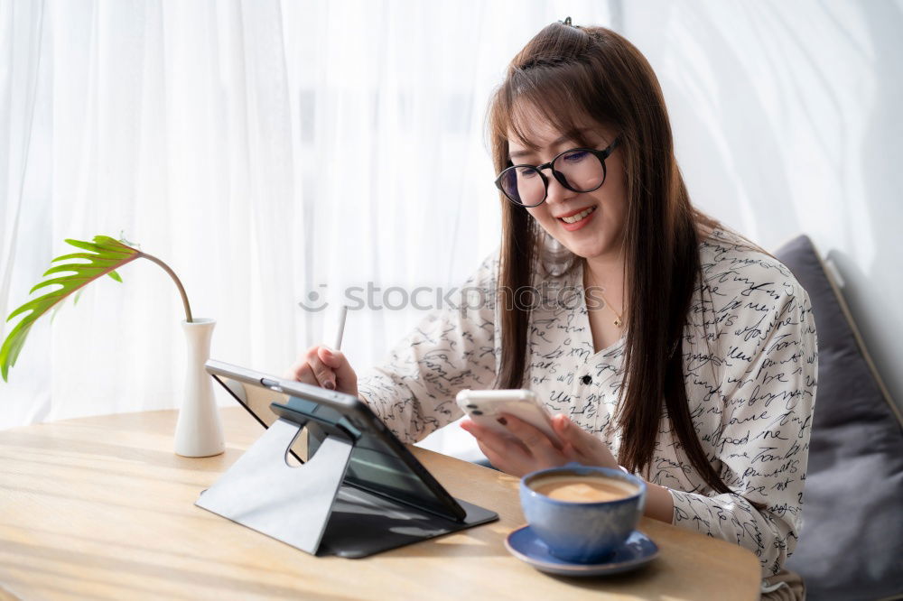 Similar – Image, Stock Photo Young beautiful woman with laptop , smartphone and coffee in a Restaurant