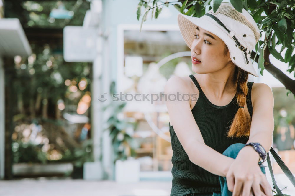 Similar – Image, Stock Photo Pretty stylish woman putting on cap