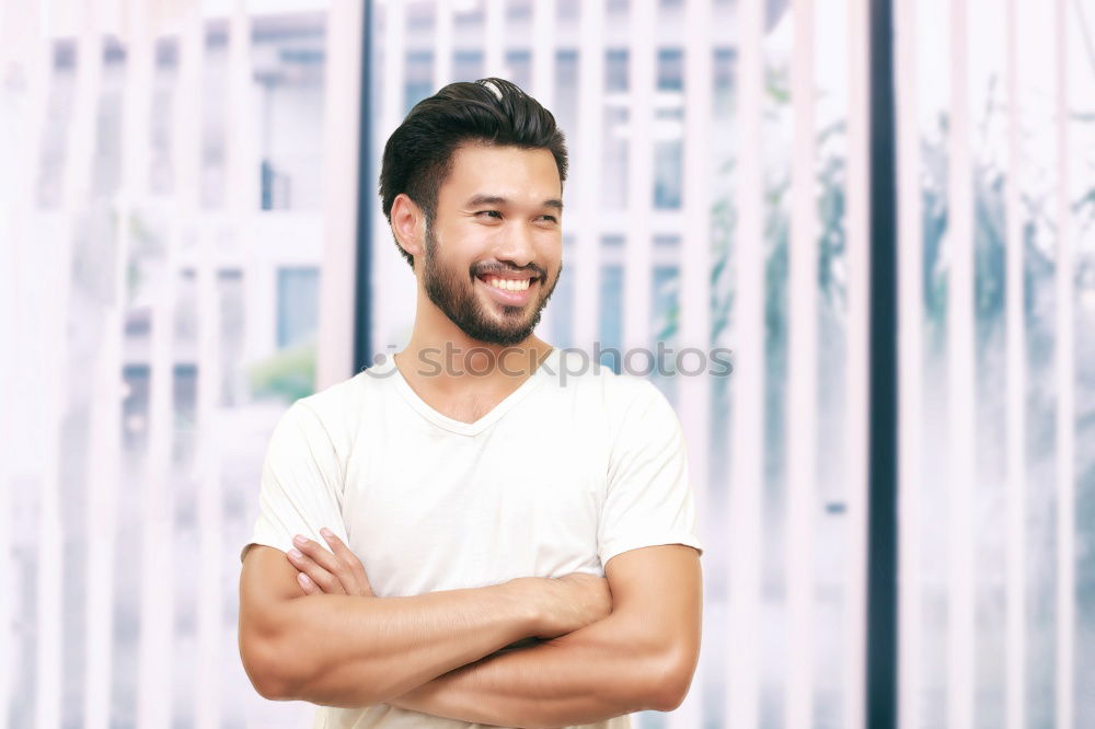 Similar – Image, Stock Photo Young guy with modern hairstyle standing looking away