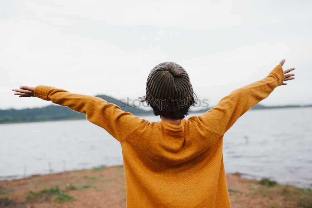 Similar – Image, Stock Photo A women with a bottle in her hand looks at the landscape