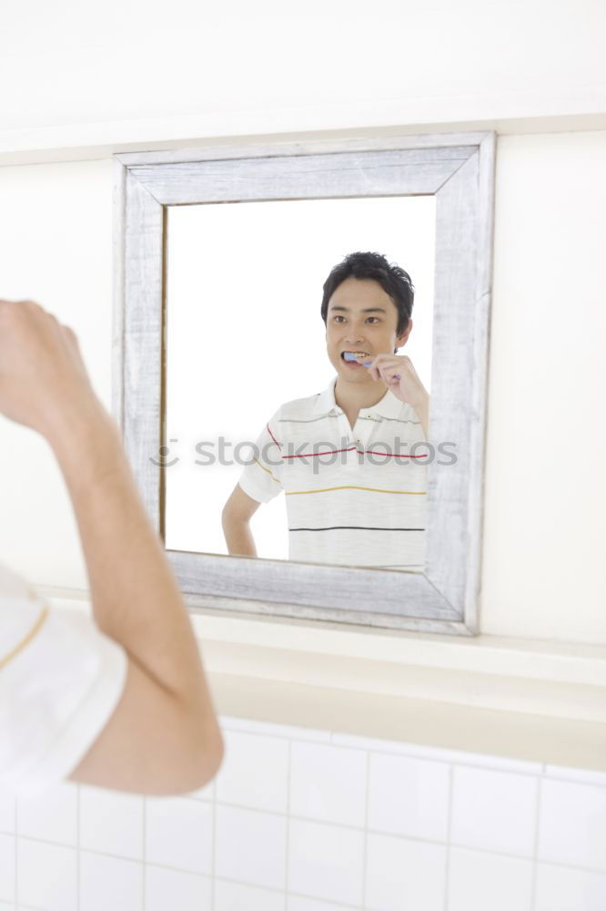 Similar – Selfie with the mobile in front of the mirror