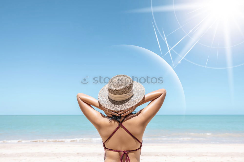 Similar – A young woman sitting under a surfboard