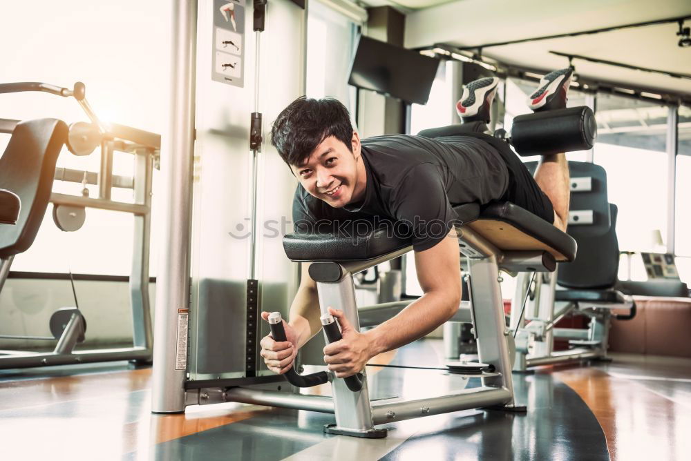 Similar – Attractive man doing pushups in the gym.